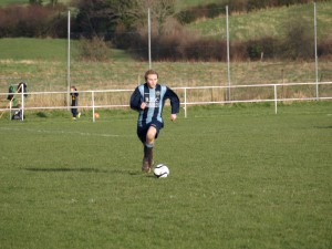 Stuart McMullan with the ball